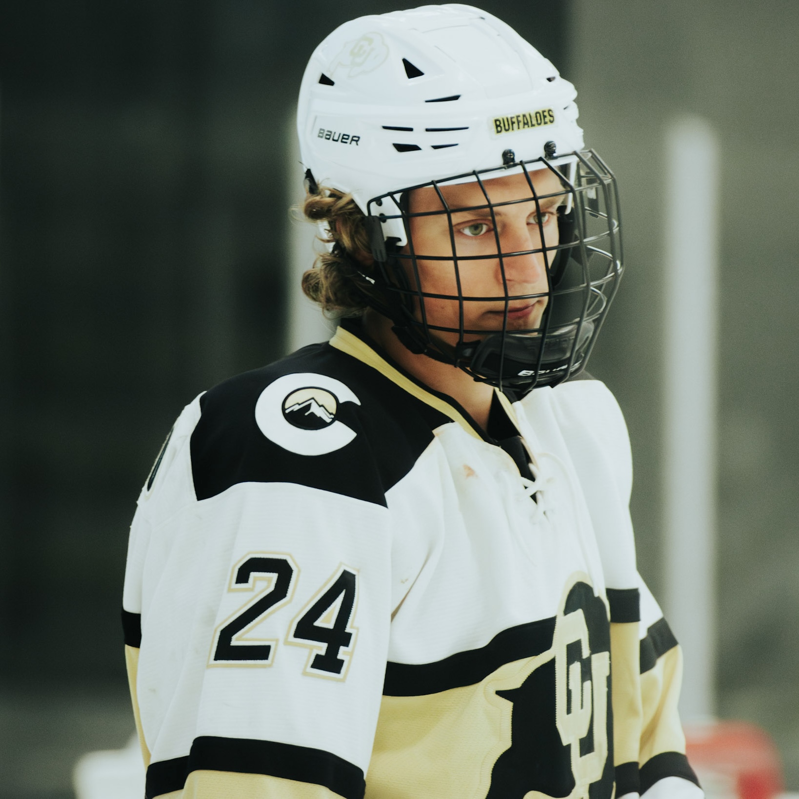 Roman Di Domizio in a CU Boulder ice hockey uniform on the ice